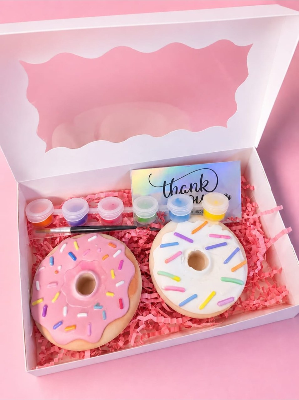 Gipspakket met donuts, verf en penseel
