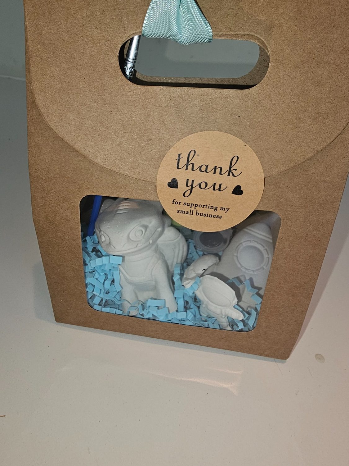 Klein doosje met mini dierfiguurtjes